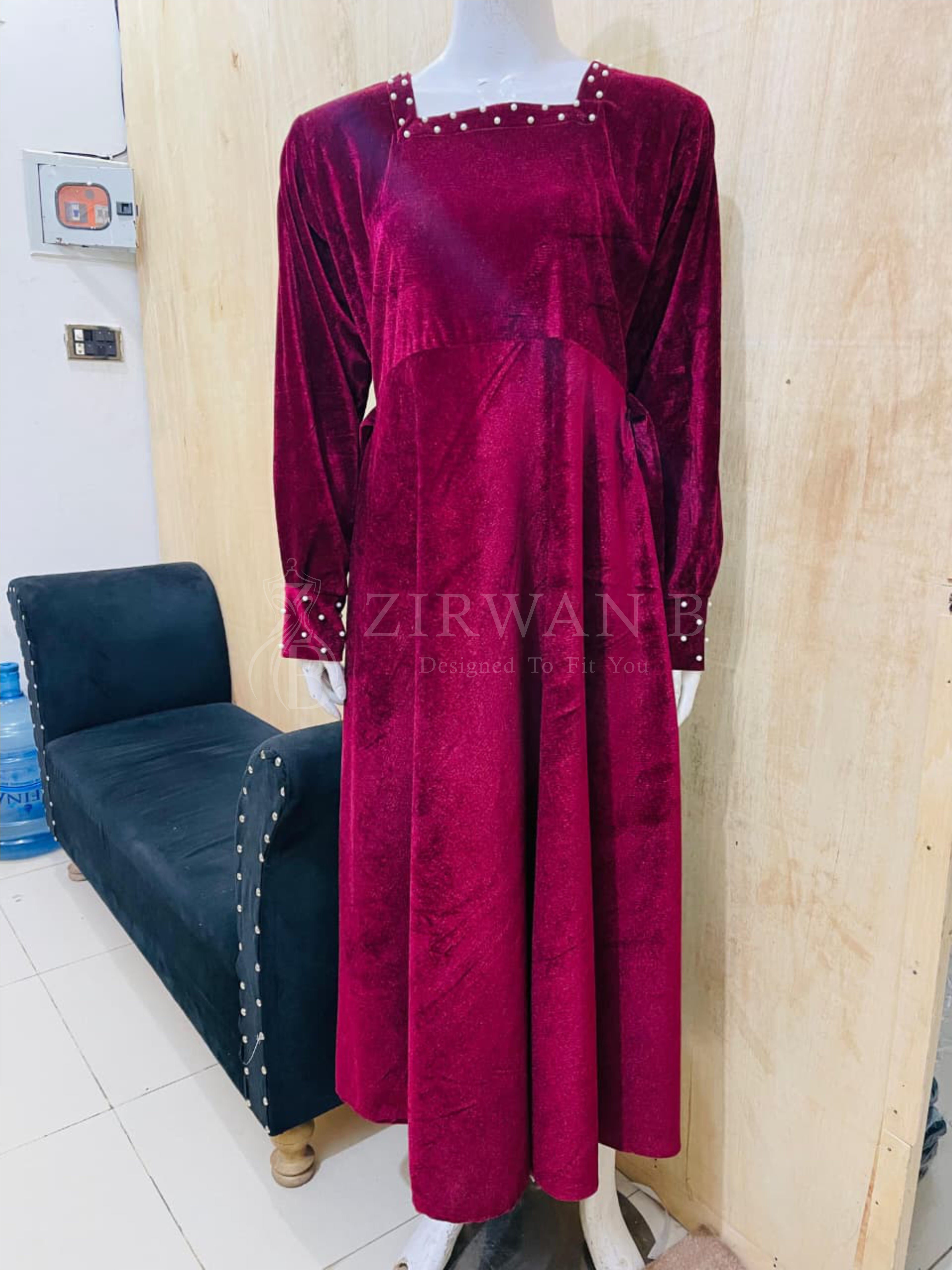 Luxurious Long-Sleeve Velvet Gown with Beaded Neckline and Cuffs