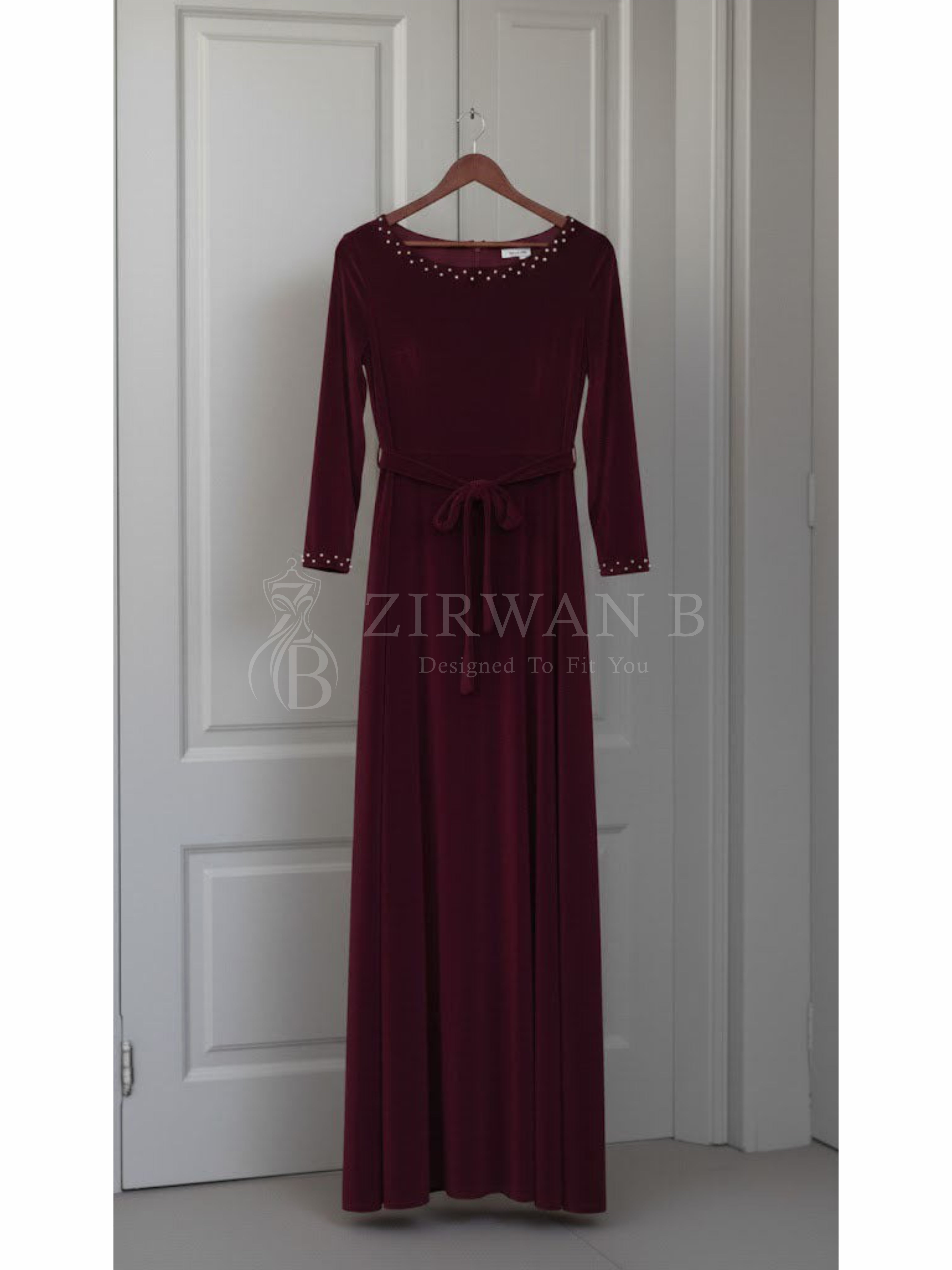 Luxurious Long-Sleeve Velvet Gown with Beaded Neckline and Cuffs