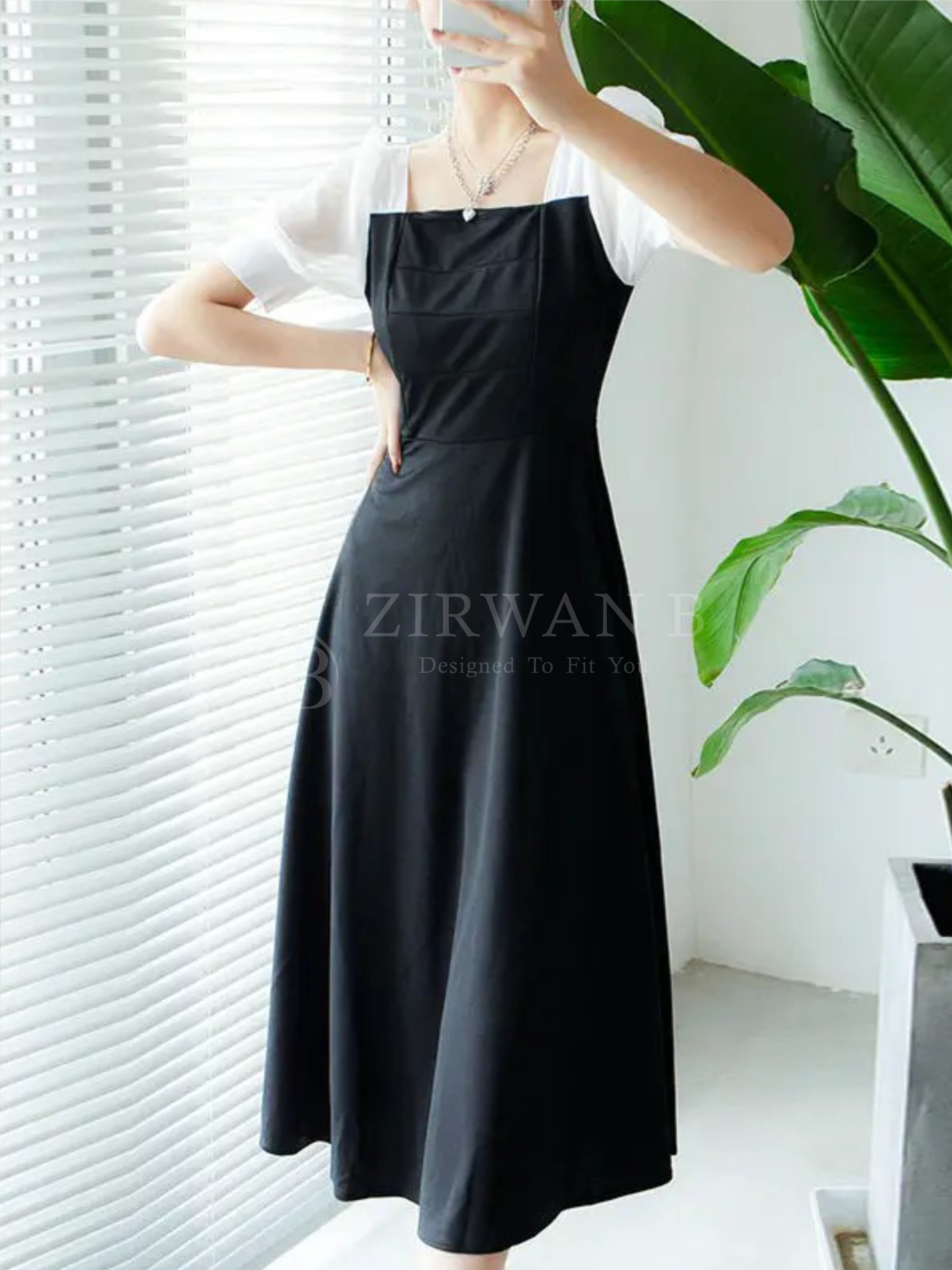 Platted Black Maxi with White Sleeves